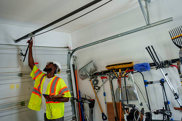 Professional Garage Door Panel Replacement technician working in Bell Gardens, CA